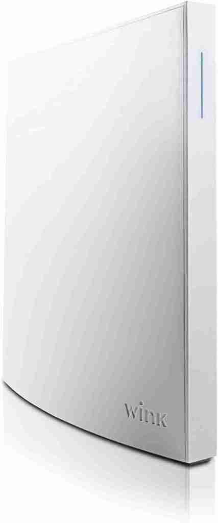 A white external hard drive on a white surface.