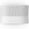 White smart speaker with a minimalist design featuring a curved front grille, integrated buttons for volume, play/pause, and other controls on the flat surface below the grille.